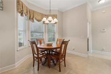 Step into a world of elegance and comfort with this timeless on Laurel Island Links in Georgia - for sale on GolfHomes.com, golf home, golf lot