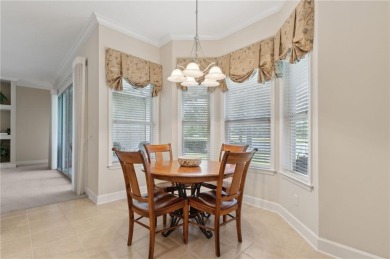 Step into a world of elegance and comfort with this timeless on Laurel Island Links in Georgia - for sale on GolfHomes.com, golf home, golf lot