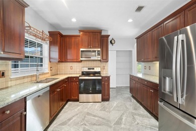 This corner lot, well updated DeBary Plantation home with a on DeBary Golf and Country Club in Florida - for sale on GolfHomes.com, golf home, golf lot
