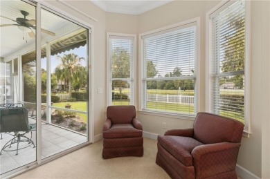 Step into a world of elegance and comfort with this timeless on Laurel Island Links in Georgia - for sale on GolfHomes.com, golf home, golf lot