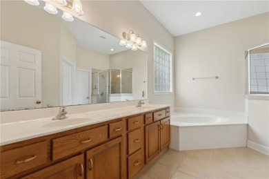 Step into a world of elegance and comfort with this timeless on Laurel Island Links in Georgia - for sale on GolfHomes.com, golf home, golf lot
