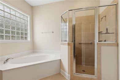 Step into a world of elegance and comfort with this timeless on Laurel Island Links in Georgia - for sale on GolfHomes.com, golf home, golf lot