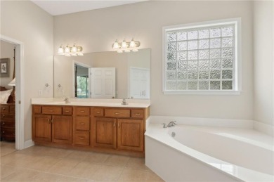 Step into a world of elegance and comfort with this timeless on Laurel Island Links in Georgia - for sale on GolfHomes.com, golf home, golf lot