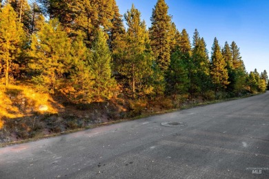 Perched atop scenic Aspen Ridge, this rare one-acre homesite on McCall Municipal Golf Course in Idaho - for sale on GolfHomes.com, golf home, golf lot