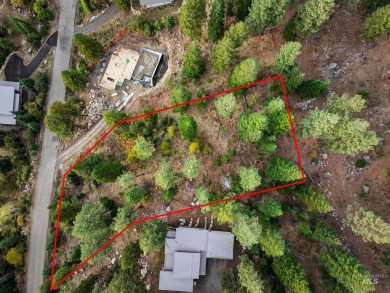 Perched atop scenic Aspen Ridge, this rare one-acre homesite on McCall Municipal Golf Course in Idaho - for sale on GolfHomes.com, golf home, golf lot