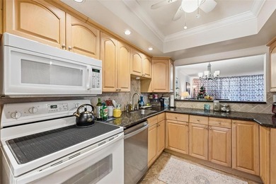 Rarely available 2-bedroom, 1-bath corner unit offering on Palm-Aire Country Club and Resort - The Oaks in Florida - for sale on GolfHomes.com, golf home, golf lot