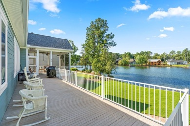 Lakefront luxury waits for you inside the exclusive Grand Harbor on The Patriot Golf Club At Grand Harbor in South Carolina - for sale on GolfHomes.com, golf home, golf lot