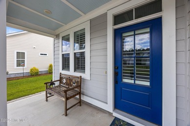 Welcome to this beautifully appointed home in the vibrant on Carolina Colours Golf Club in North Carolina - for sale on GolfHomes.com, golf home, golf lot