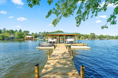 Lakefront luxury waits for you inside the exclusive Grand Harbor on The Patriot Golf Club At Grand Harbor in South Carolina - for sale on GolfHomes.com, golf home, golf lot