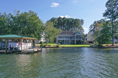 Lakefront luxury waits for you inside the exclusive Grand Harbor on The Patriot Golf Club At Grand Harbor in South Carolina - for sale on GolfHomes.com, golf home, golf lot