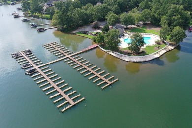 Lakefront luxury waits for you inside the exclusive Grand Harbor on The Patriot Golf Club At Grand Harbor in South Carolina - for sale on GolfHomes.com, golf home, golf lot