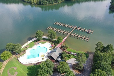 Lakefront luxury waits for you inside the exclusive Grand Harbor on The Patriot Golf Club At Grand Harbor in South Carolina - for sale on GolfHomes.com, golf home, golf lot