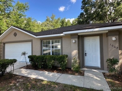 This beautifully renovated home in Citrus Springs boasts a range on Citrus Springs Country Club in Florida - for sale on GolfHomes.com, golf home, golf lot