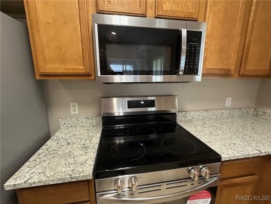 This beautifully renovated home in Citrus Springs boasts a range on Citrus Springs Country Club in Florida - for sale on GolfHomes.com, golf home, golf lot