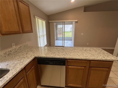 This beautifully renovated home in Citrus Springs boasts a range on Citrus Springs Country Club in Florida - for sale on GolfHomes.com, golf home, golf lot