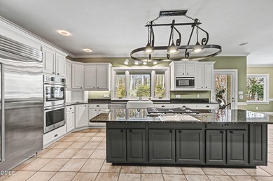 Turnkey masterpiece offered below appraised value in Durham's on Treyburn Country Club in North Carolina - for sale on GolfHomes.com, golf home, golf lot