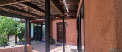 This Santa Fe style home is absolutely charming and rich in on Sierra Del Rio Golf Club in New Mexico - for sale on GolfHomes.com, golf home, golf lot