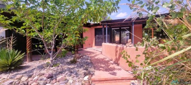 This Santa Fe style home is absolutely charming and rich in on Sierra Del Rio Golf Club in New Mexico - for sale on GolfHomes.com, golf home, golf lot