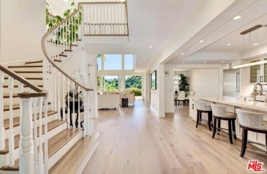 Nestled in one of Los Angeles' most coveted communities, this on Mountain Gate Country Club in California - for sale on GolfHomes.com, golf home, golf lot