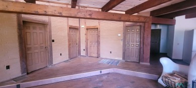 This Santa Fe style home is absolutely charming and rich in on Sierra Del Rio Golf Club in New Mexico - for sale on GolfHomes.com, golf home, golf lot