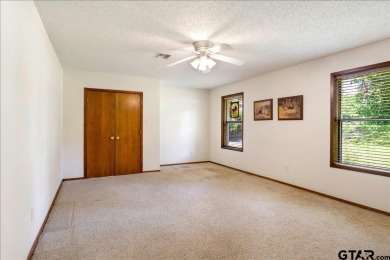 Discover the potential in this 3 bedroom, 2 bath home tucked on Hide-A-Way Lake Golf Course in Texas - for sale on GolfHomes.com, golf home, golf lot