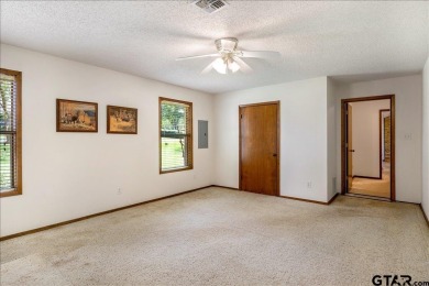 Discover the potential in this 3 bedroom, 2 bath home tucked on Hide-A-Way Lake Golf Course in Texas - for sale on GolfHomes.com, golf home, golf lot