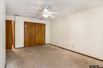 Discover the potential in this 3 bedroom, 2 bath home tucked on Hide-A-Way Lake Golf Course in Texas - for sale on GolfHomes.com, golf home, golf lot