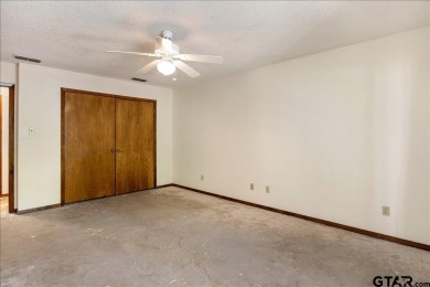 Discover the potential in this 3 bedroom, 2 bath home tucked on Hide-A-Way Lake Golf Course in Texas - for sale on GolfHomes.com, golf home, golf lot