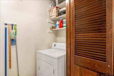 Discover the potential in this 3 bedroom, 2 bath home tucked on Hide-A-Way Lake Golf Course in Texas - for sale on GolfHomes.com, golf home, golf lot
