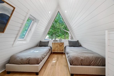 This one of a kind Scandanavian inspired A-frame offers a on Tanglewood Resort in Texas - for sale on GolfHomes.com, golf home, golf lot