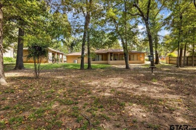 Discover the potential in this 3 bedroom, 2 bath home tucked on Hide-A-Way Lake Golf Course in Texas - for sale on GolfHomes.com, golf home, golf lot