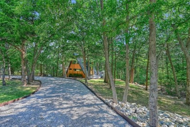 This one of a kind Scandanavian inspired A-frame offers a on Tanglewood Resort in Texas - for sale on GolfHomes.com, golf home, golf lot