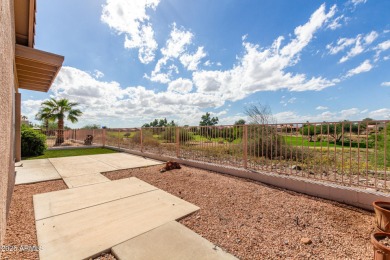 Nestled in the serene cul-de-sac of the prestigious Coyote Lakes on Coyote Lakes Golf Club in Arizona - for sale on GolfHomes.com, golf home, golf lot