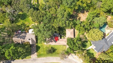 Discover the potential in this 3 bedroom, 2 bath home tucked on Hide-A-Way Lake Golf Course in Texas - for sale on GolfHomes.com, golf home, golf lot