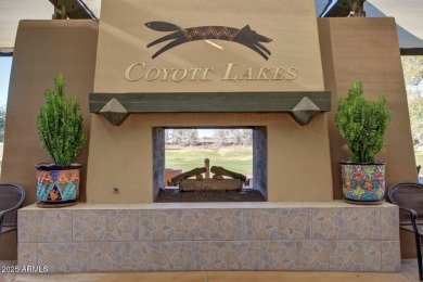 Nestled in the serene cul-de-sac of the prestigious Coyote Lakes on Coyote Lakes Golf Club in Arizona - for sale on GolfHomes.com, golf home, golf lot