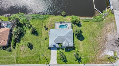Nestled in the heart of desirable Rotonda West--a fast-growing on Rotonda Golf and Country Club - Long Marsh  in Florida - for sale on GolfHomes.com, golf home, golf lot