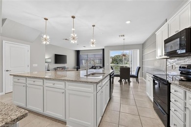 Welcome to this exceptional 3-bedroom, 2.5-bath lakeview on Gateway Golf and Country Club in Florida - for sale on GolfHomes.com, golf home, golf lot