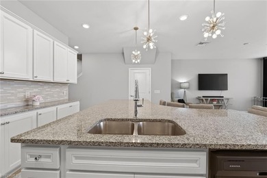 Welcome to this exceptional 3-bedroom, 2.5-bath lakeview on Gateway Golf and Country Club in Florida - for sale on GolfHomes.com, golf home, golf lot