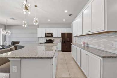 Welcome to this exceptional 3-bedroom, 2.5-bath lakeview on Gateway Golf and Country Club in Florida - for sale on GolfHomes.com, golf home, golf lot