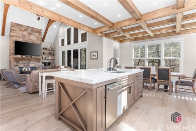 Discover the epitome of luxury living in this exquisite estate on Reynolds Lake Oconee - The Oconee in Georgia - for sale on GolfHomes.com, golf home, golf lot