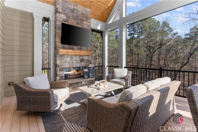 Discover the epitome of luxury living in this exquisite estate on Reynolds Lake Oconee - The Oconee in Georgia - for sale on GolfHomes.com, golf home, golf lot