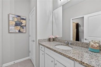 Welcome to this exceptional 3-bedroom, 2.5-bath lakeview on Gateway Golf and Country Club in Florida - for sale on GolfHomes.com, golf home, golf lot