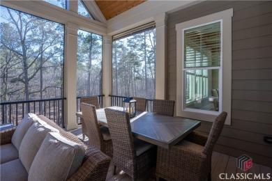 Discover the epitome of luxury living in this exquisite estate on Reynolds Lake Oconee - The Oconee in Georgia - for sale on GolfHomes.com, golf home, golf lot