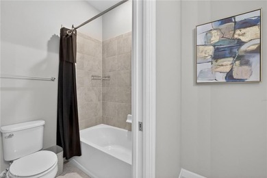 Welcome to this exceptional 3-bedroom, 2.5-bath lakeview on Gateway Golf and Country Club in Florida - for sale on GolfHomes.com, golf home, golf lot