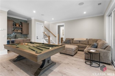 Discover the epitome of luxury living in this exquisite estate on Reynolds Lake Oconee - The Oconee in Georgia - for sale on GolfHomes.com, golf home, golf lot
