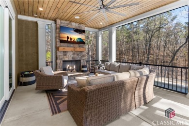Discover the epitome of luxury living in this exquisite estate on Reynolds Lake Oconee - The Oconee in Georgia - for sale on GolfHomes.com, golf home, golf lot