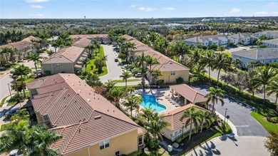 Welcome to this exceptional 3-bedroom, 2.5-bath lakeview on Gateway Golf and Country Club in Florida - for sale on GolfHomes.com, golf home, golf lot