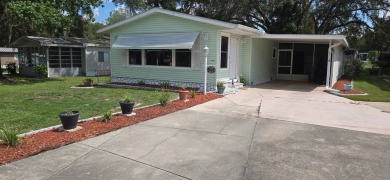 Tucked-Away Treasure - Updated & Move-In Ready for Just $50,000! on Rolling Greens Executive Golf Community in Florida - for sale on GolfHomes.com, golf home, golf lot