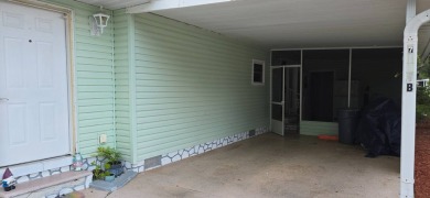 Tucked-Away Treasure - Updated & Move-In Ready for Just $50,000! on Rolling Greens Executive Golf Community in Florida - for sale on GolfHomes.com, golf home, golf lot