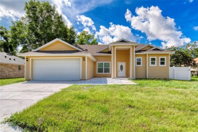 This newly remodeled 3-bedroom, 3-bathroom home in the desirable on The Grand Club - Pine Lakes Course in Florida - for sale on GolfHomes.com, golf home, golf lot
